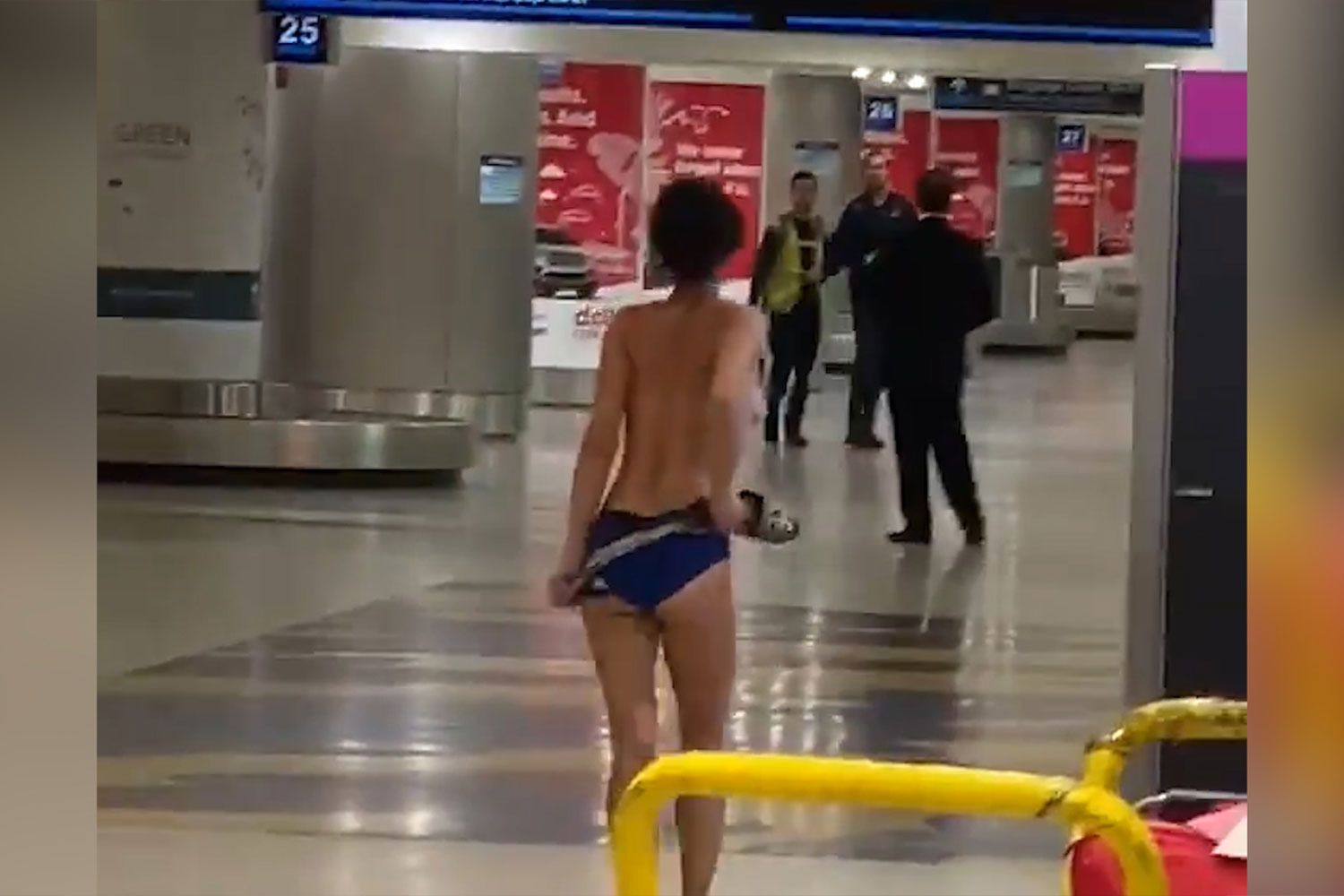 Woman arrested after naked, delusional spree in Miami airport - NZ Herald