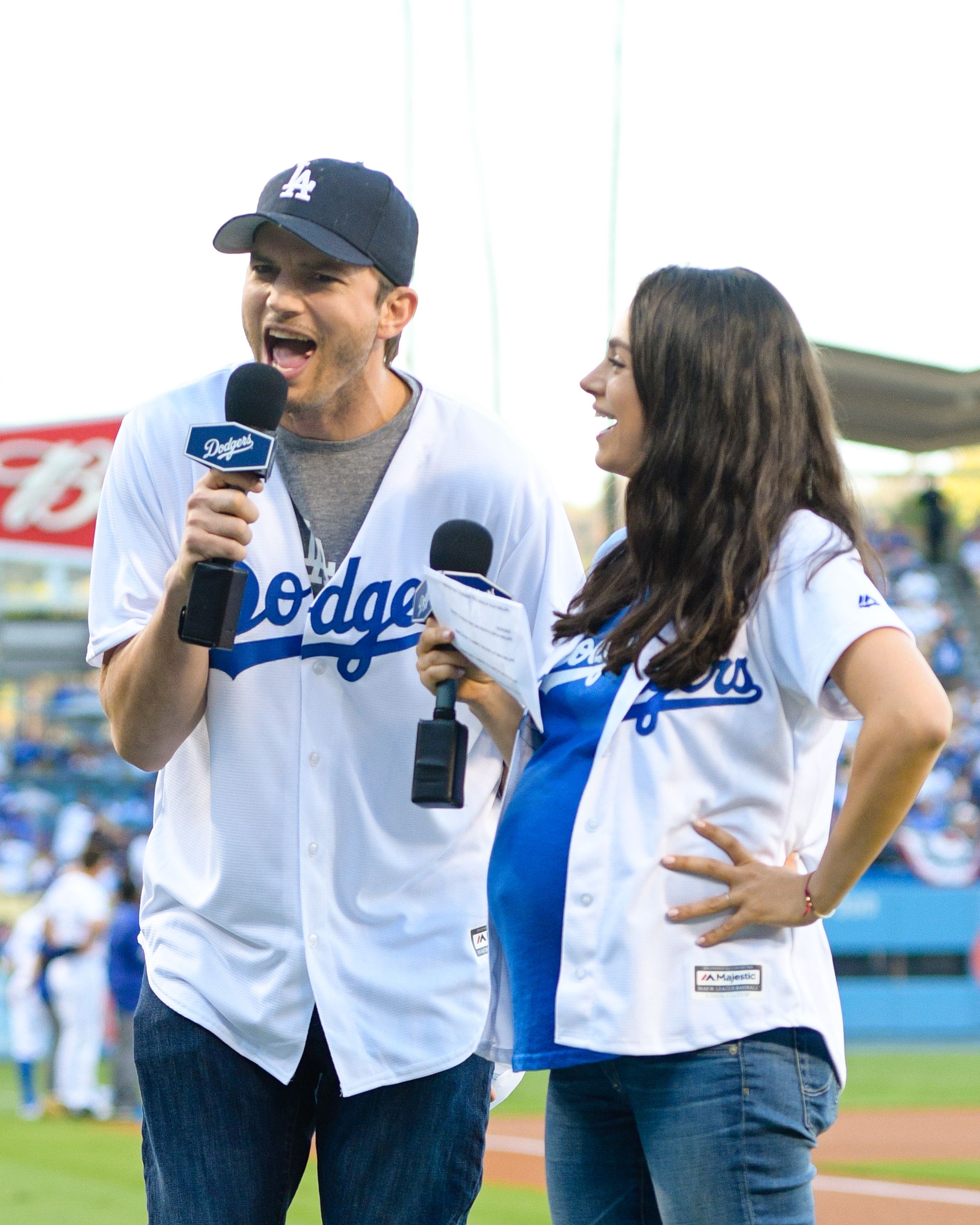 Pregnant Mila Kunis Brings Huge Baby Bump to Dodgers Game with