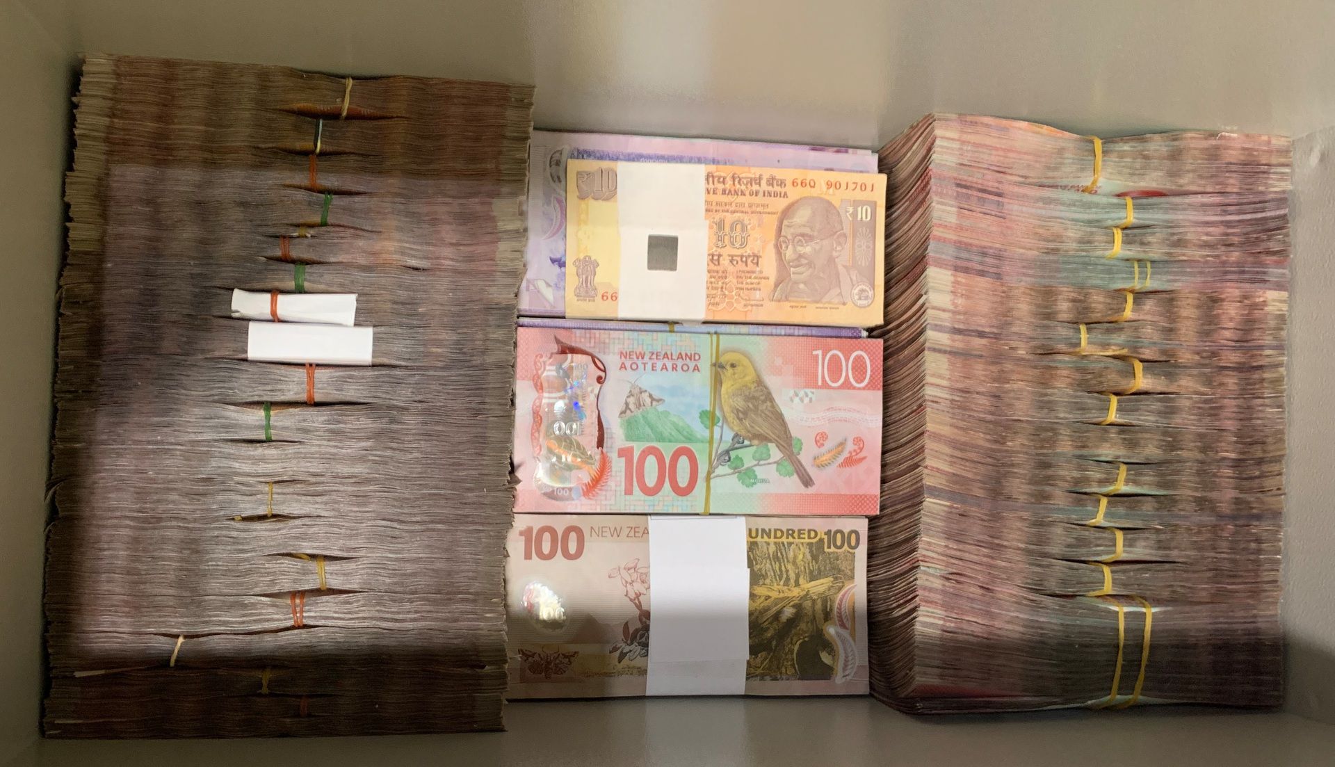 Auckland drug raids: hundreds of thousands dollars in cash, gold, 400 cartons of seized - NZ Herald